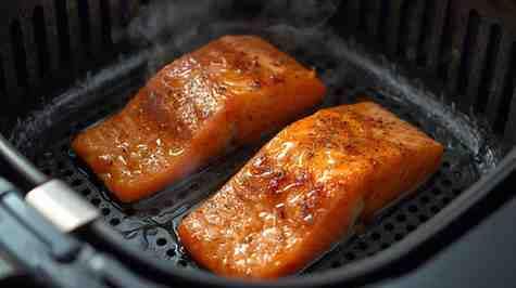 Salmon cooking on air fryer